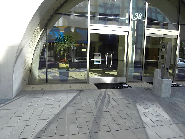 front entrance of Axis. 24h security