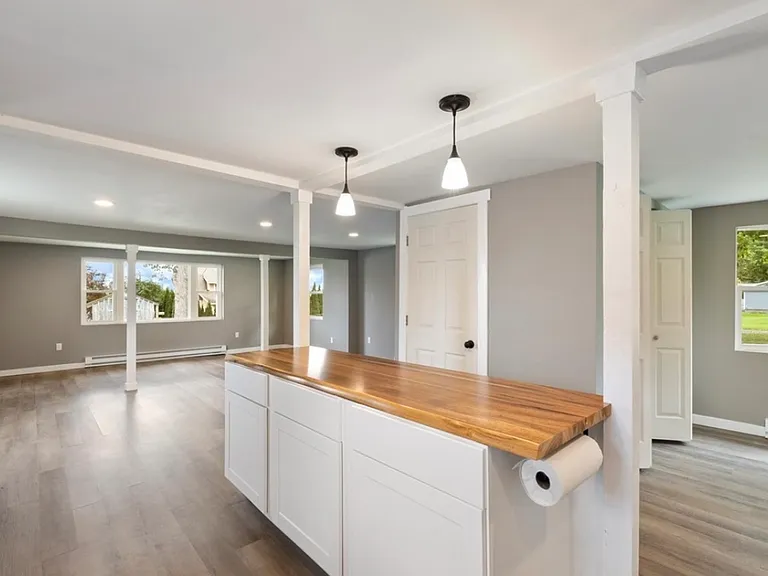 Island with view to front room & living room