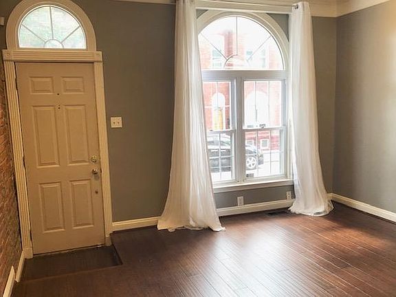 Large front windows by front door