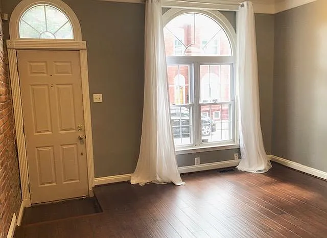 Large front windows by front door