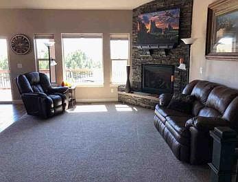 Open living room next to kitchen