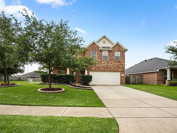 A great benefit for families with multiple cars, is the full double-wide driveway for easier access and additional parking for your guests.