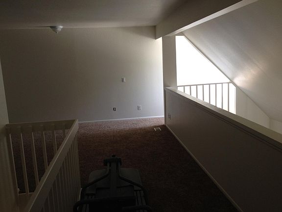 View of master bedroom in upstairs loft