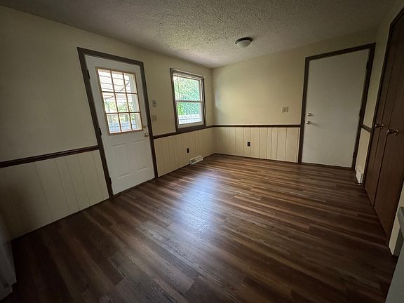 Other view of kitchen - back door leading to private deck