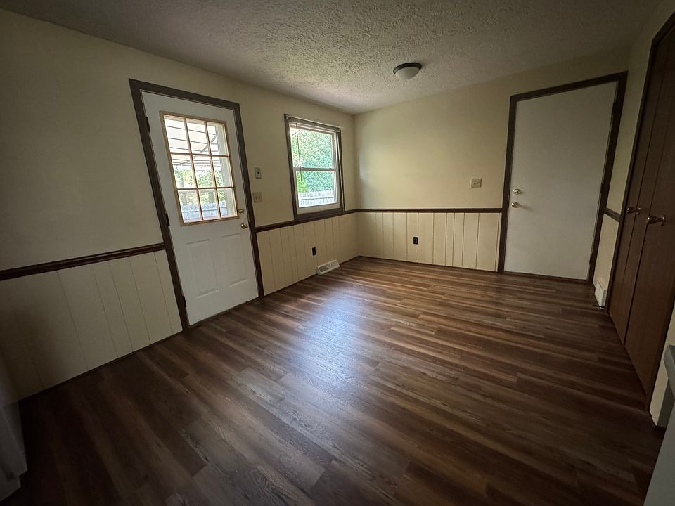 Other view of kitchen - back door leading to private deck