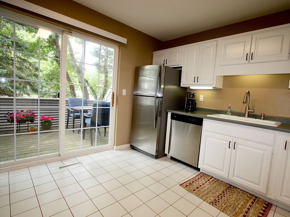 Bright kitchen that walks out to the side patio.