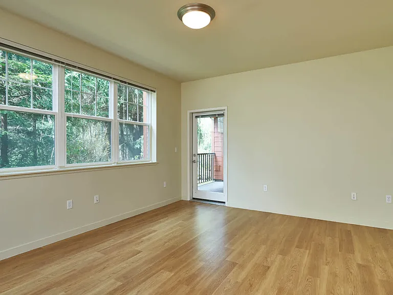 Living Room with Balcony and Hard Surface Flooring