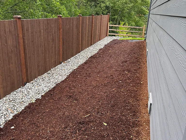 Left side of house leading to back yard.