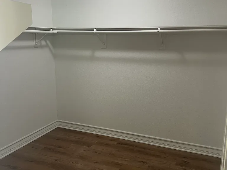 Master bedroom walk- in closet