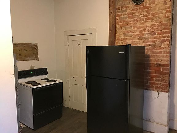 New Fridge, new water heater, same stove, new flooring.