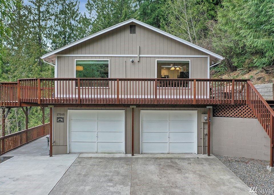 Welcome home to this private retreat nestled in the trees! 