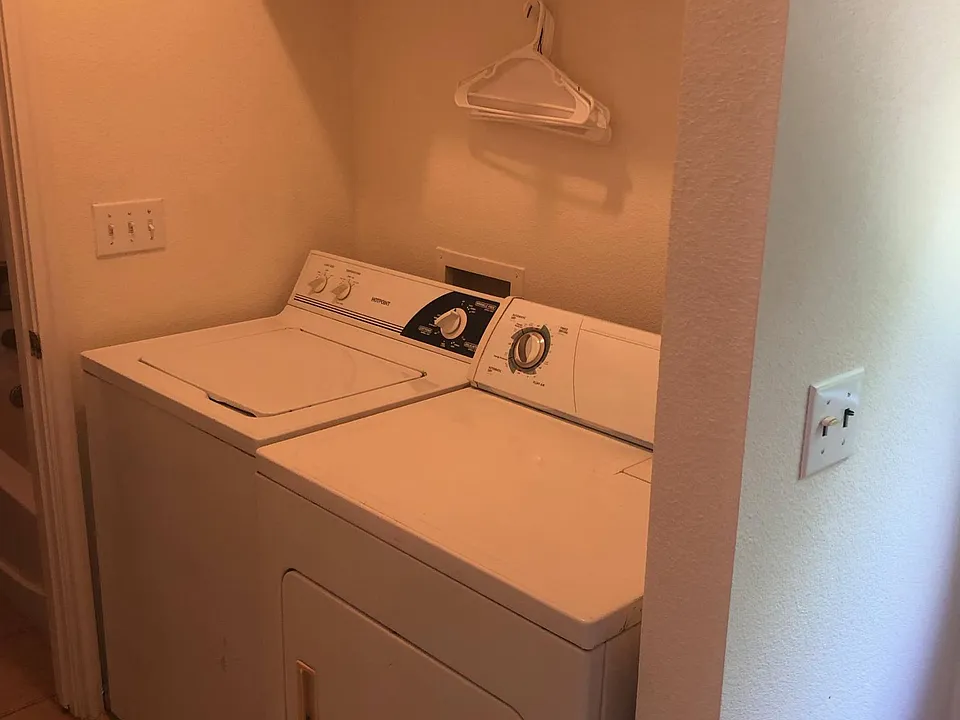 Laundry room with washer and drier right off the kitchen.