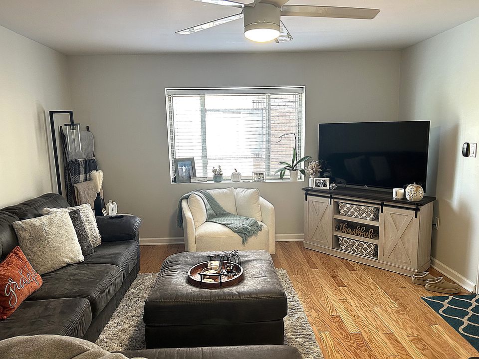 Living room (Decorated w/ large sofa)