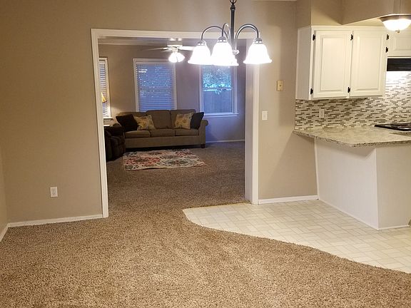 Dining room between kitchen and den