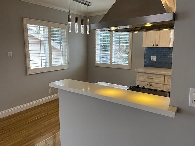 Dining area with modern lighting