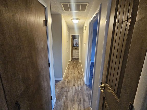 Hallway looking to bathroom