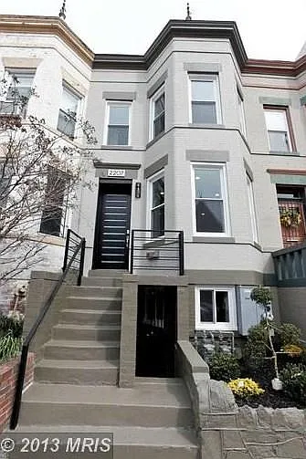 Front of home. Unit 2's entry is on the right.