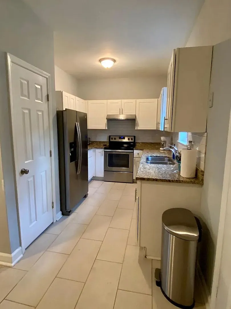 Room in 4 Bedroom Home at Jones Ave NW — Photo 4