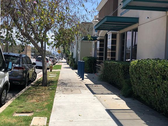 Sidewalk in front of property