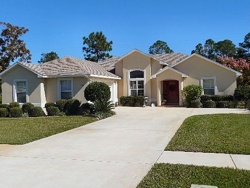 Front with 2 car garage