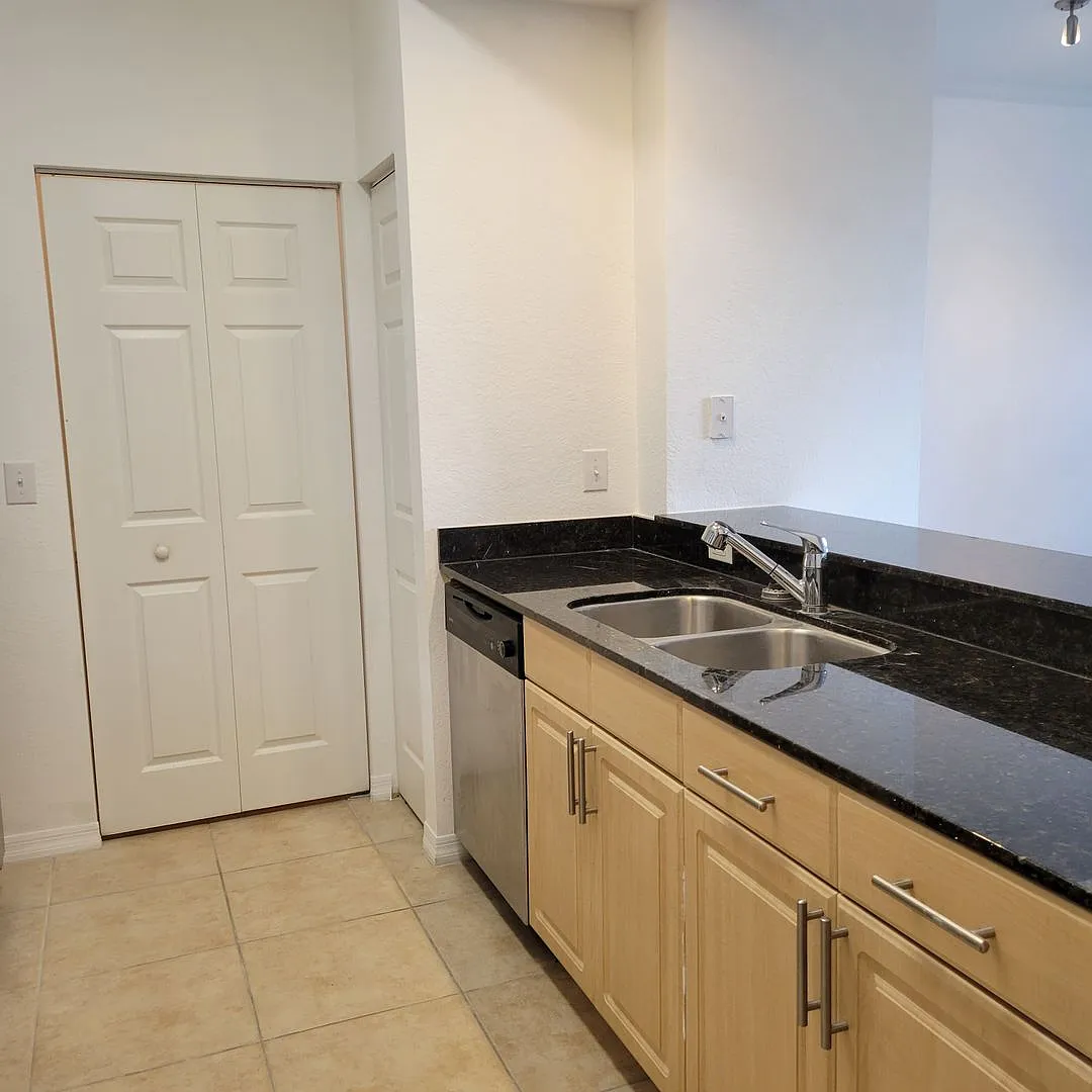 Building Photo - 1064 N Tamiami Trl #1325
