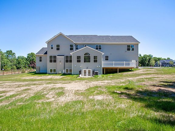 The Greenbrier Exterior Backside Image Taken During the Afternoon New Home From Hallmark Homes