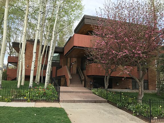Entrance from corner of 3rd and Hopkins. With a modern, Frank Llyod Wright style architecture, our building has four owners with six apartments. Our apartment is garden level to right, with a private yard off a small deck.