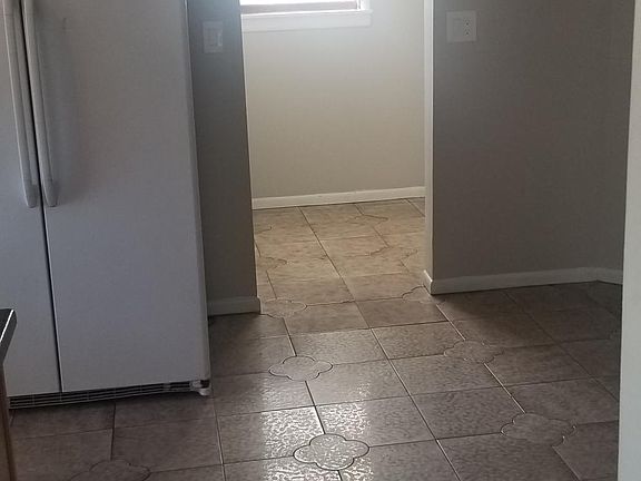 View from hallway into kitchen hallway