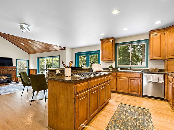 Bright open kitchen with views to the lovely backyard 