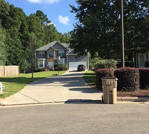 Front of house farther back