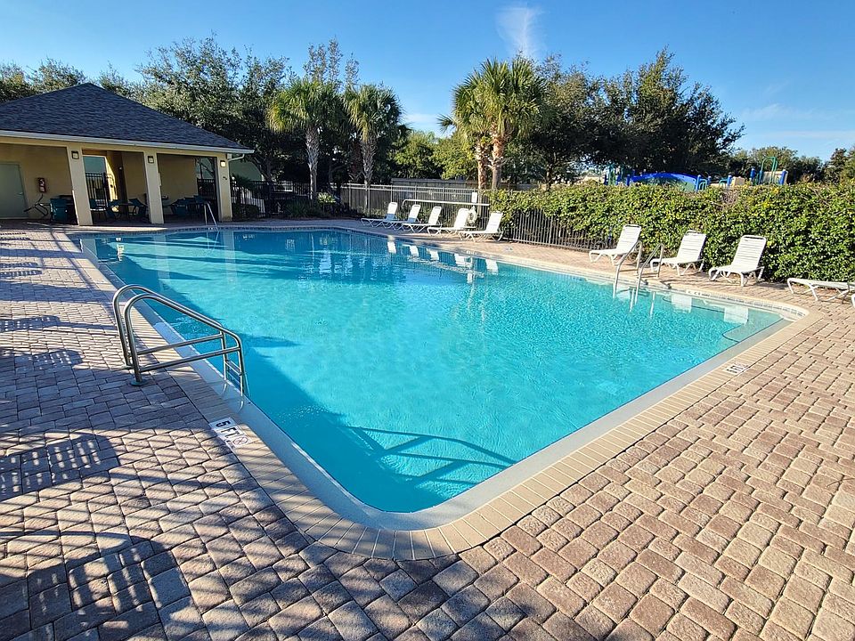 Community Pool with Bathrooms and Outdoor Shower