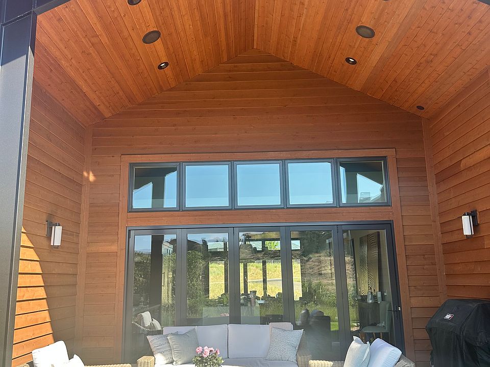 Rear Outdoor patio with furnishings and grill