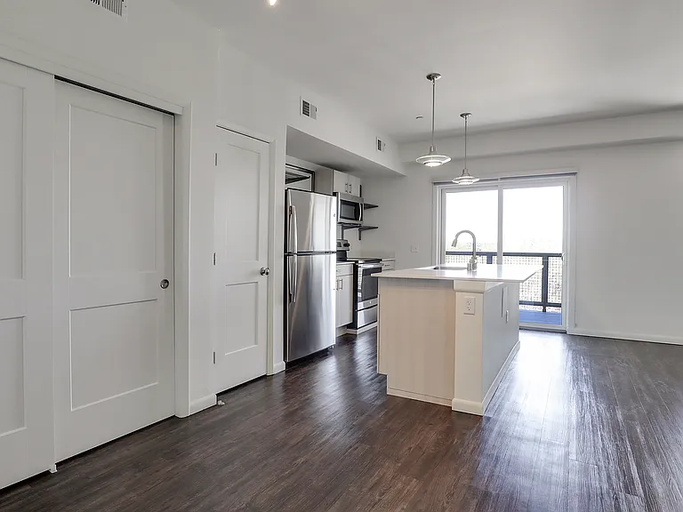312 Pictured, 314 (top floor) has flipped/mirror floorplan, same fixtures & finishes