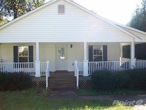 Inviting Wrap Around Porch...
