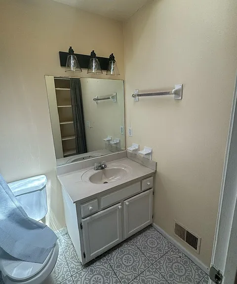 Upstairs bath with imported tile floor