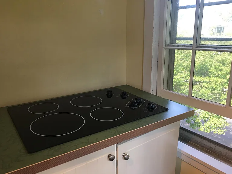 Kitchen Stovetop and Storage Cabinet