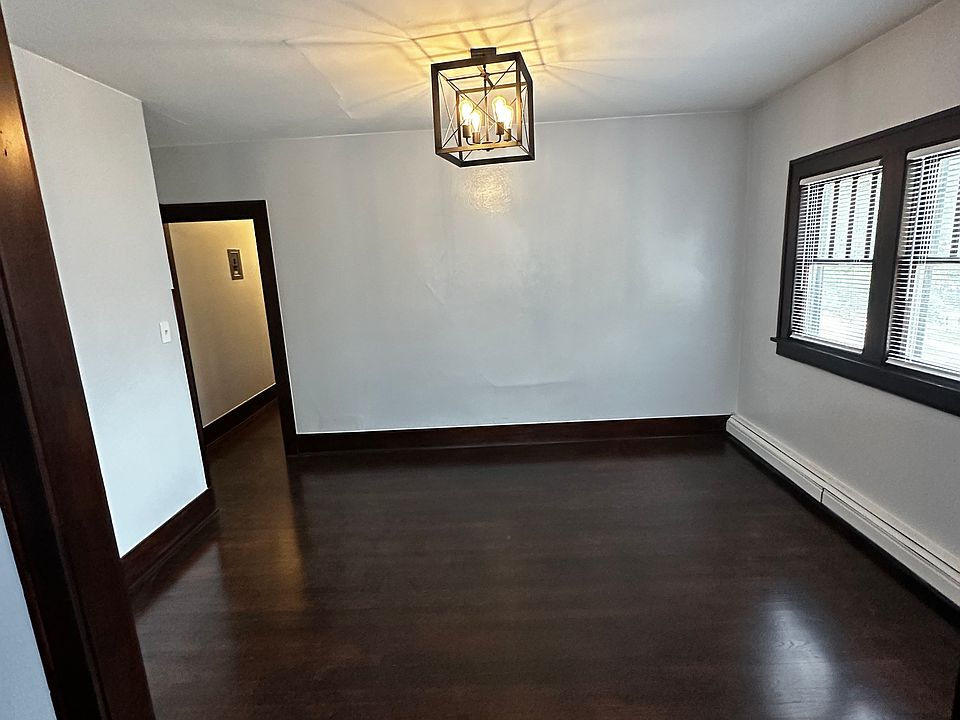Spacious dining room; with good natural light, overhead chandelier with dimmer
