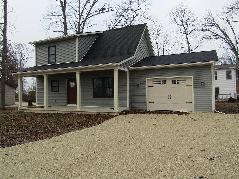 Front of home. Enjoy a view of Grand Lake and Northmoor Golf Course from this spacious front porch. Lawn and hard-surface driveway to be installed Spring 2020!