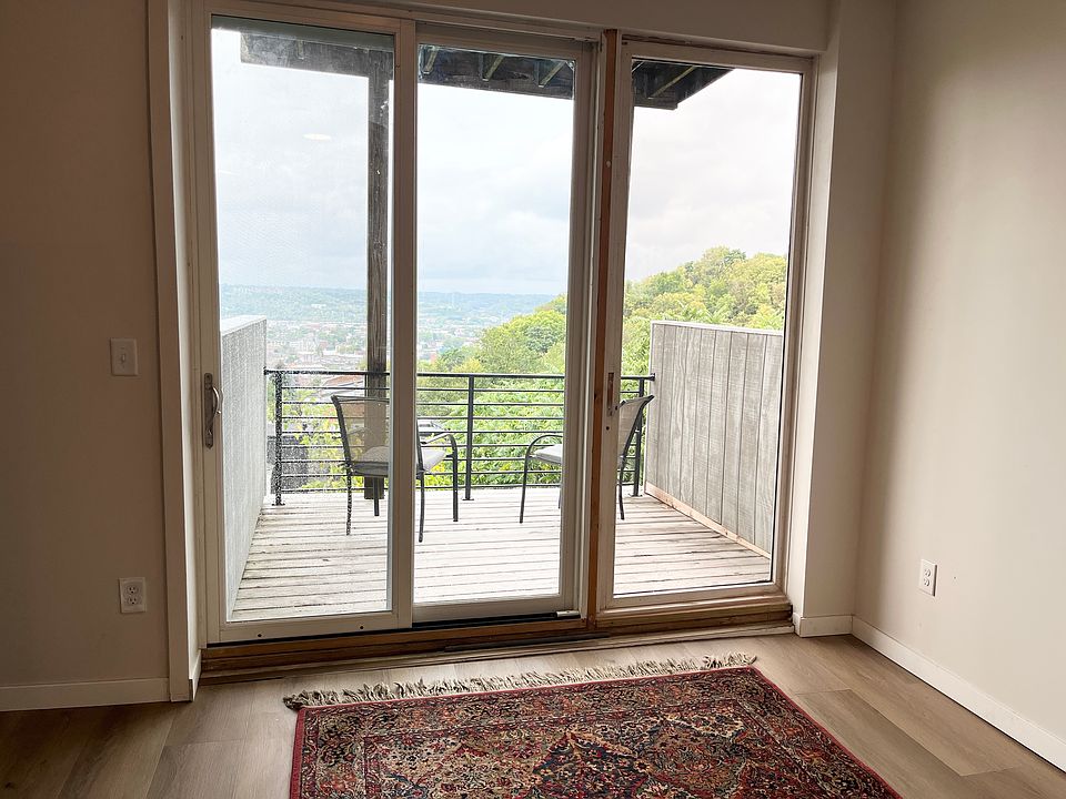Living Room and one of two balconies.