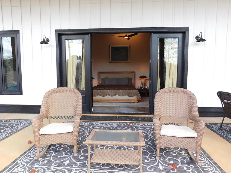Porch off of Master bedroom offers an abundance of seating areas