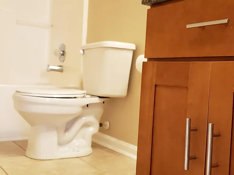 Upgraded cabinetry and stone tile floors