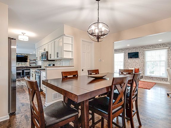 Lovely dining room with chic light fixture