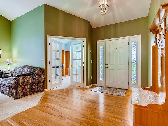 Main floor foyer, formal living area and office with french doors!