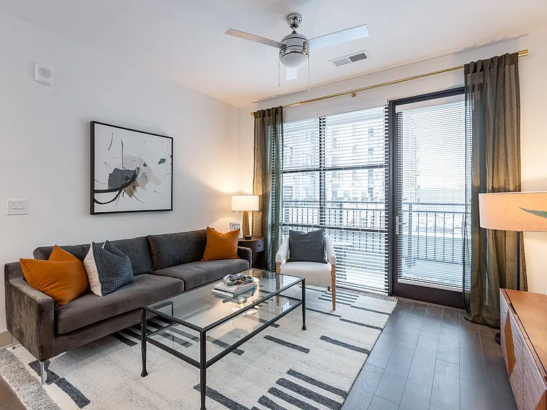 Enjoy abundant natural light and elevated design in this inviting living space.