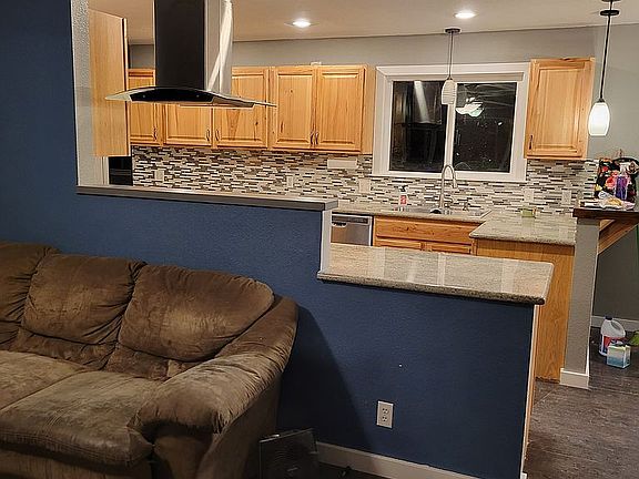 open to kitchen/dining room