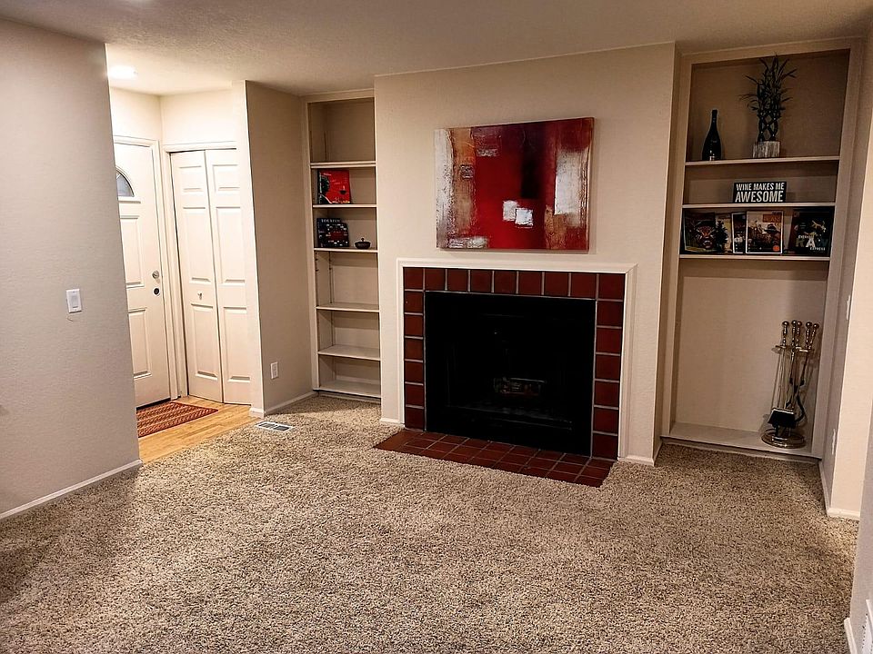 living room with real fireplace!
