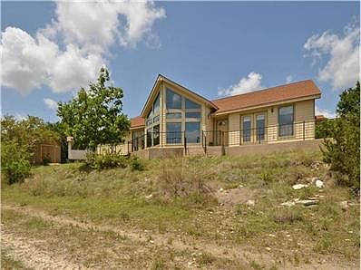 Situated on a 5+ acre, cul-de-sac lot, this home has stunning Hi