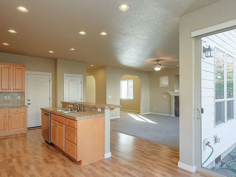 6387 NE Meadowgate Ct — Photo 10