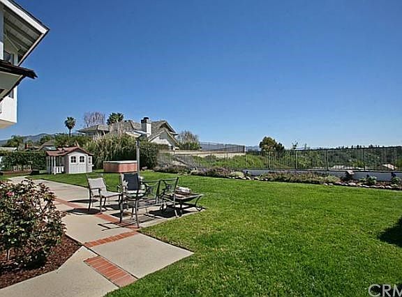 Enjoy the gorgeous views from this private large backyard.