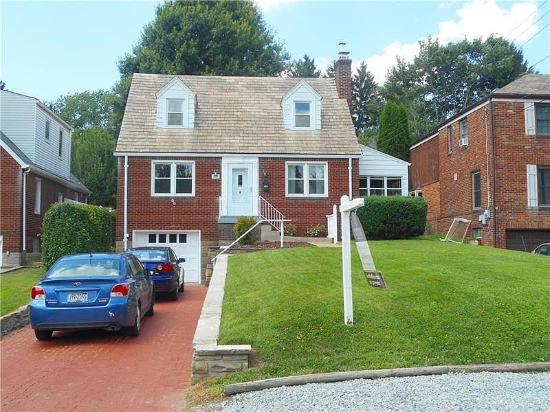 Exterior Front: This remarkable 3 BR, 1.5 Bath brick home has all the charm of a bygone era when quality was not an option, and 